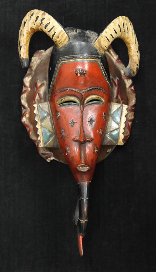 A Guro Ivory Coast painted wood mask, 16in.